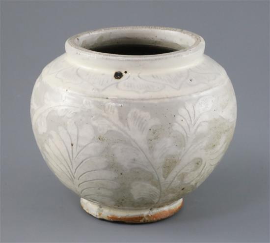 A Chinese Cizhou carved globular jar, probably Song-Jin dynasty H. 14.5cm, glaze imperfections